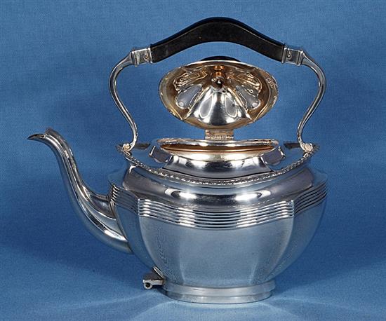 A silver kettle on stand, Height 11 ½”/290mm Width: 9”/230mm Weight 42.8oz/1213g.